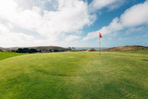 Green with view of Gull Rocks at Holywell Bay Golf, near Newquay